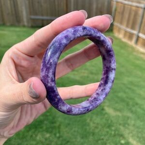 Purple mica Lepidolite crystal hard bangle. Inside diameter 55 mm. 13mm wide